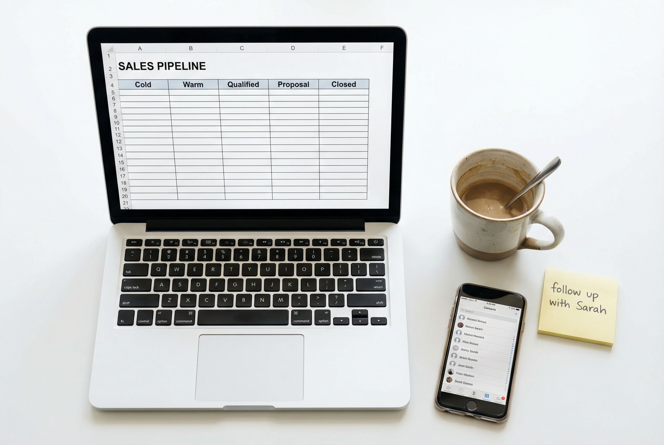 Overhead view of a laptop showing a completely empty sales pipeline template with columns labelled Cold, Warm, Qualified, next to a sticky note reading follow up with Sarah